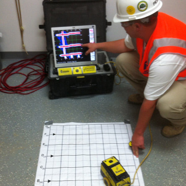 employee explaining device readout